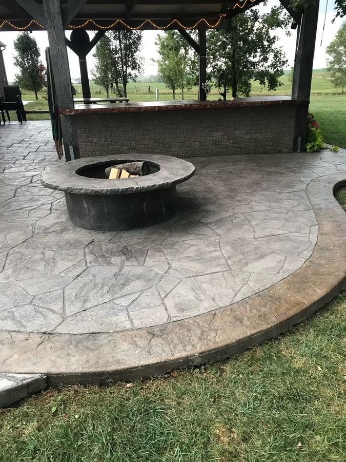 Custom stamped concrete patio with fire pit by A2Z Concrete in Gainesville, Florida